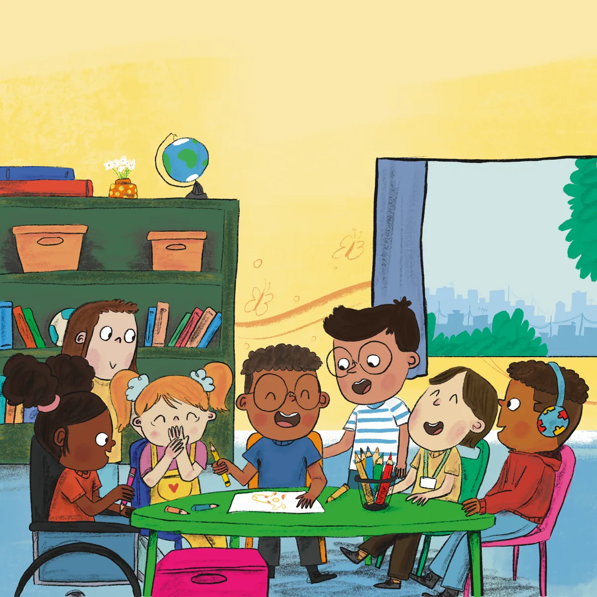 Children gather around a table in the classroom.